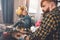 Couple with hangover sitting in messy room