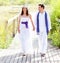 Couple happy in wedding day walking outdoor