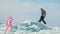 Couple has fun during winter walk against background of ice of f