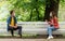 Couple have date during the coronavirus lockdown crisis. Man and woman in the park. Social distancing and virus