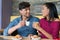 Couple having breakfast at coffee bar