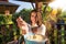 Couple Having Breakfast Together Point Of View, Young Woman Feeding Man With Oatmeal With Fresh Fruits Outdoors