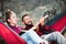 Couple having fun in a hammock on a picnic