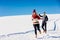 Couple having fun running down slope