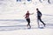 Couple having fun running down slope