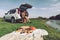 couple having picnic date at river beach