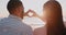 Couple, heart and hands at beach in sun, sky or love on romantic holiday, vacation or summer flare. Closeup, man and