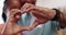 Couple, heart and hands in home of love, date and commitment of happy partner together. Closeup man, woman and finger