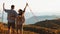 Couple hikers blurred on foreground enjoying amazing autumn mountain sunset view