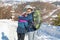 Couple of hikers exploring snowy mountain