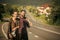 Couple of hikers happy smile on asphalt road