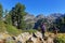 Couple of hikers on the mountain path GR738 between Chamrousse and the hut of La Pra