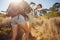 Couple hiking in mountain on a hot sunny day