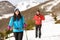 Couple hiking in snowy mountain