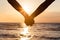 Couple holding hands at beach