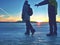 Couple holding by hands. Beautiful people in puffy jackets