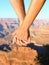 Couple holding hands hiking romantic, Grand Canyon