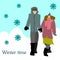 The couple are holding hands in the winter on the street