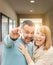 Couple Holding House Keys Inside Hallway of Their New Home