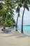 Couple on Honeymoon relax on Aitutaki lagoon