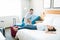 Couple On Honeymoon Relaxing In Hotel Room