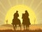 Couple on horseback in the desert