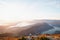 Couple hugging on the background of the panorama of Mount Lovcen, Kotor Bay, Montenegro