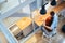 Couple hugging and drinking juice in kitchen