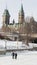 Couple ice skating on the frozen Rideau Canal Ottawa Winterlude