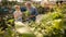 Couple Inside Greenhouse In Garden Centre Choosing And Buying Plants 