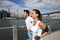 Couple of joggers by hudson river