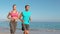 Couple jogging on beach