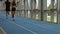 Couple jogging on indoor track
