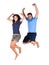 Couple jumping high in the air for joy