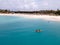 Couple Kayaking in the Ocean on Vacation Aruba Caribbean sea, man and woman mid age kayak in ocean blue clrea water