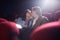 Couple Kissing on Date in Cinema