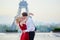 Couple kissing in front of the Eiffel tower in Paris, France