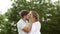 Couple Kissing. Romantic People In Love Kiss in Nature. Smiling Man And Woman.