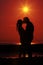 Couple kissing sundown 1