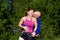 Couple Laughing Next to Bike - Horizontal