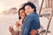 Couple, lgbtq hug and smile on beach together for relax interracial portrait on travel vacation or quality time