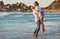 Couple lift and hug at beach celebrate dating love, care and trust on ocean summer travel or Bali vacation. Excited man