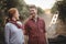 Couple looking at each other while standing at olive farm