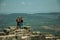 Couple looking the landscape from wall of Castle