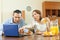 Couple looking mail during breakfast