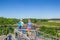 Couple looking out over the landscape of drenthe from the tower in Holmers-Halkenbroek