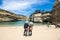 Couple looking through Rocks to Ocean, Australia