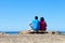 Couple Looking at Sea in an Old Dock