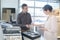 Couple looking at shaped cerramic tiles