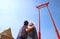 Couple Looking Up to the Amazing Giant Swing, Historic Teak Wood Swing Formerly Used in Old Ceremony in Bangkok